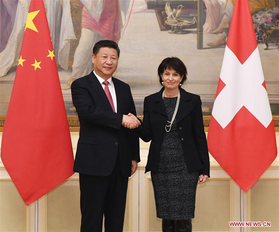 Chinese President Xi Jinping (L) shakes hands with his Swiss counterpart Doris Leuthard in Bern, Switzerland, Jan. 16, 2017. (Xinhua/Rao Aimin)